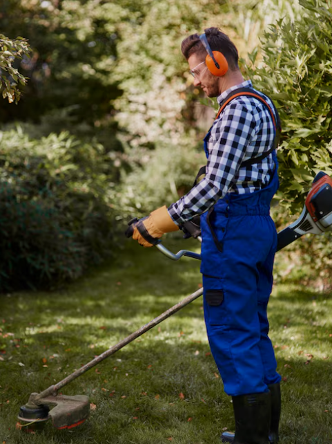 Landscaping Worker with Trimmer